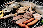 Lunch of charcoal-grilled meat and seafood